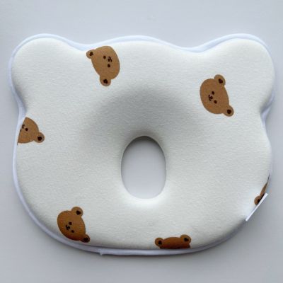 Coussin bébé anti-tête plate ergonomique et respirant crème