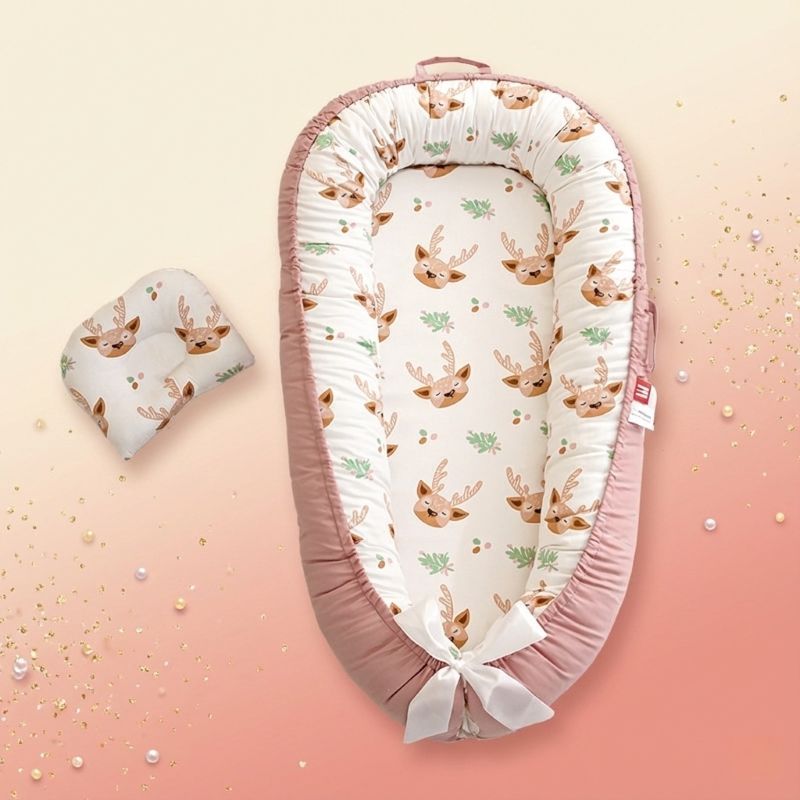 NOTRE REDUCTEUR DE LIT BEBE DEERBABYNEST