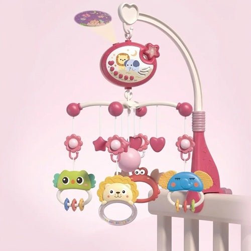Variante rose de notre mobile musical bébé | Projecteur, télécommande et hochets détachables