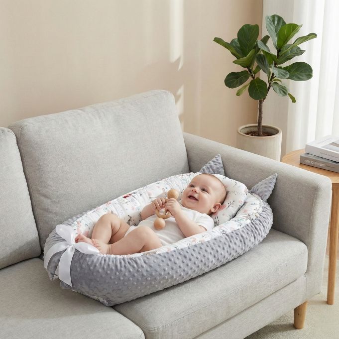 BEBE ALLONGE SUR NOTRE REDUCTEUR CODODO FORET