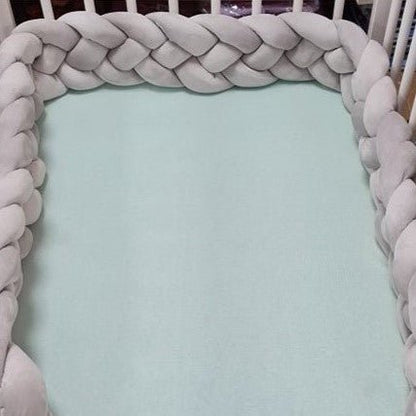 Berceau avec la Tresse de lit bébé gris CozyKnot™