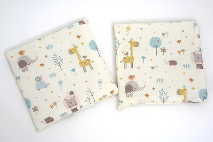 ZOOM SUR LES BLOCS DU TOUR DE LIT POUR BEBE ANIMAUX BEIGE