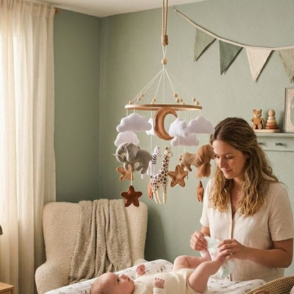 Change simplifié avec notre mobile bébé Safari Céleste