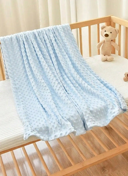 Couverture bébé Bulles douces bleue étalée