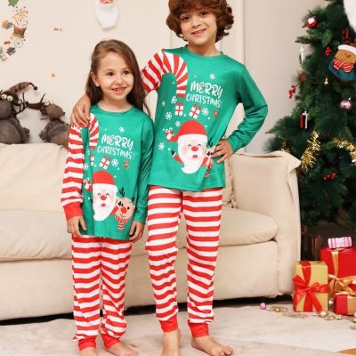 Enfants joyeux avec notre Pyjama Noel Famille SantaWish™