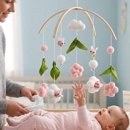 Le change simplifié avec notre mobile bébé - Le ballet des abeilles