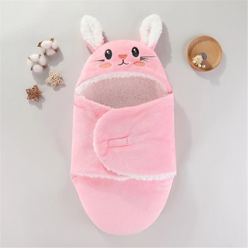 NOTRE COUVERTURE D EMMAILLOTAGE ANIMALSNUGGLE™ LAPIN ROSE FERMEE