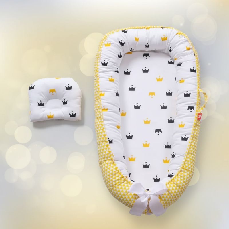 Notre réducteur cododo NidPortableBébé Royal et son petit oreiller assorti