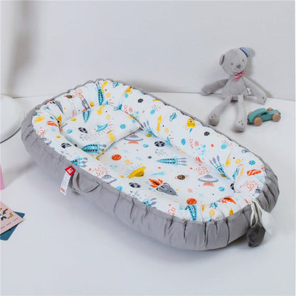 NOTRE REDUCTEUR DE LIT BEBE GALAXY