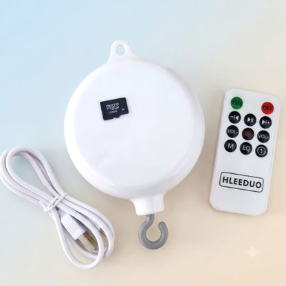 Pack de notre boîte musicale rotative pour mobile bébé avec télécommande et volume réglable