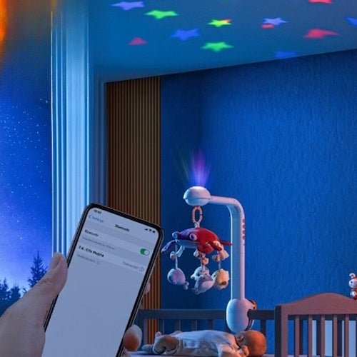 Projection étoilée de notre mobile musical bébé Crabi Dodo