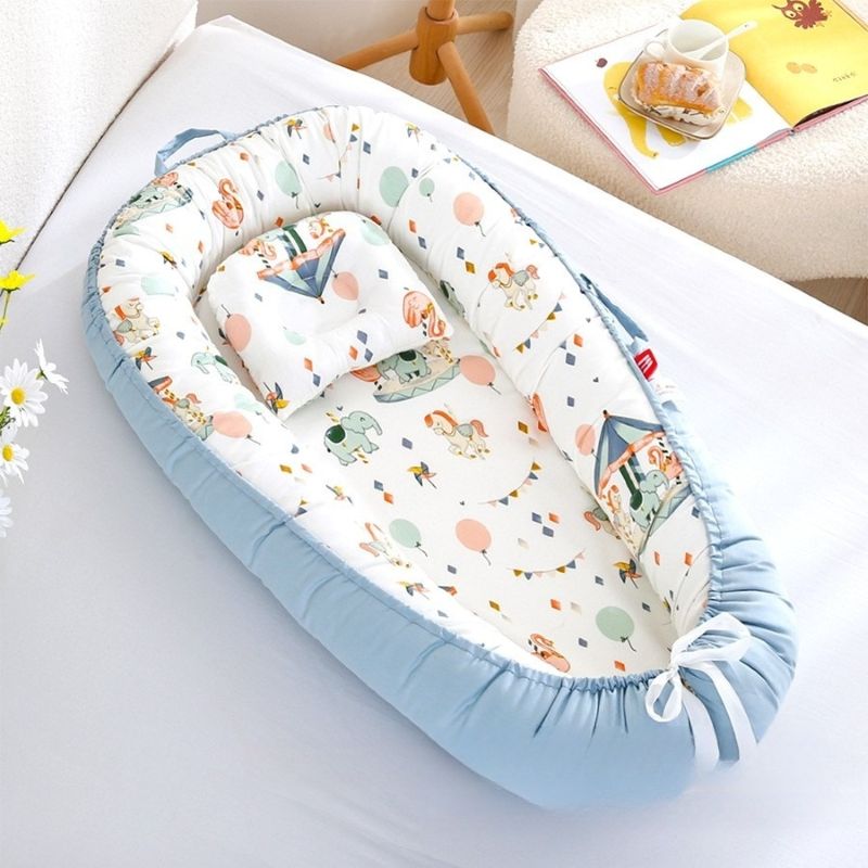 Réducteur de lit bébé Manège enchanté